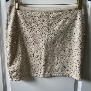 Cream mini skirt with gold/champagne sequins